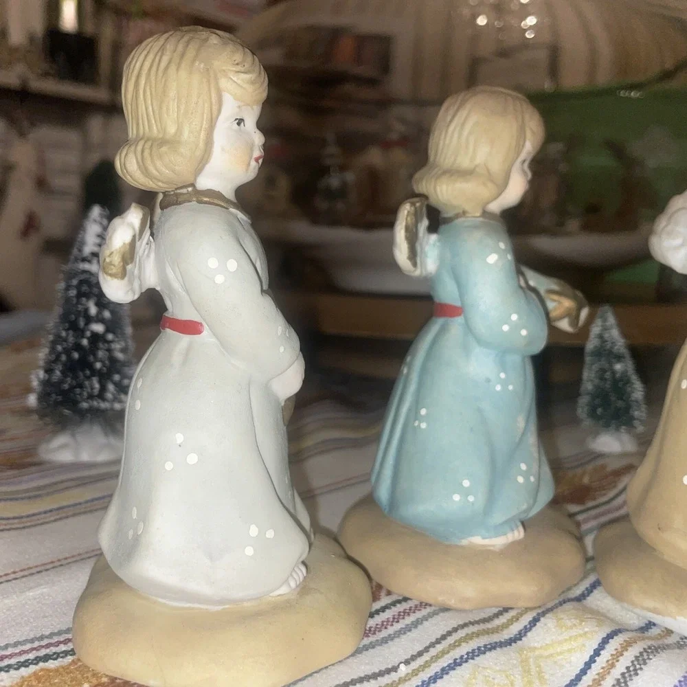 4 Distressed Young Angels In Different Poses And‎ Colors Of Dress, Very Sweet